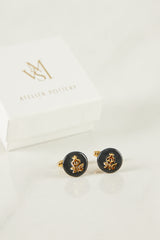 Three-initial cufflinks with gold fittings