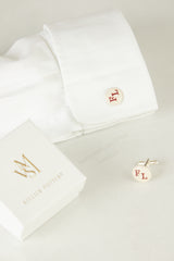 Three-initial cufflinks with gold fittings